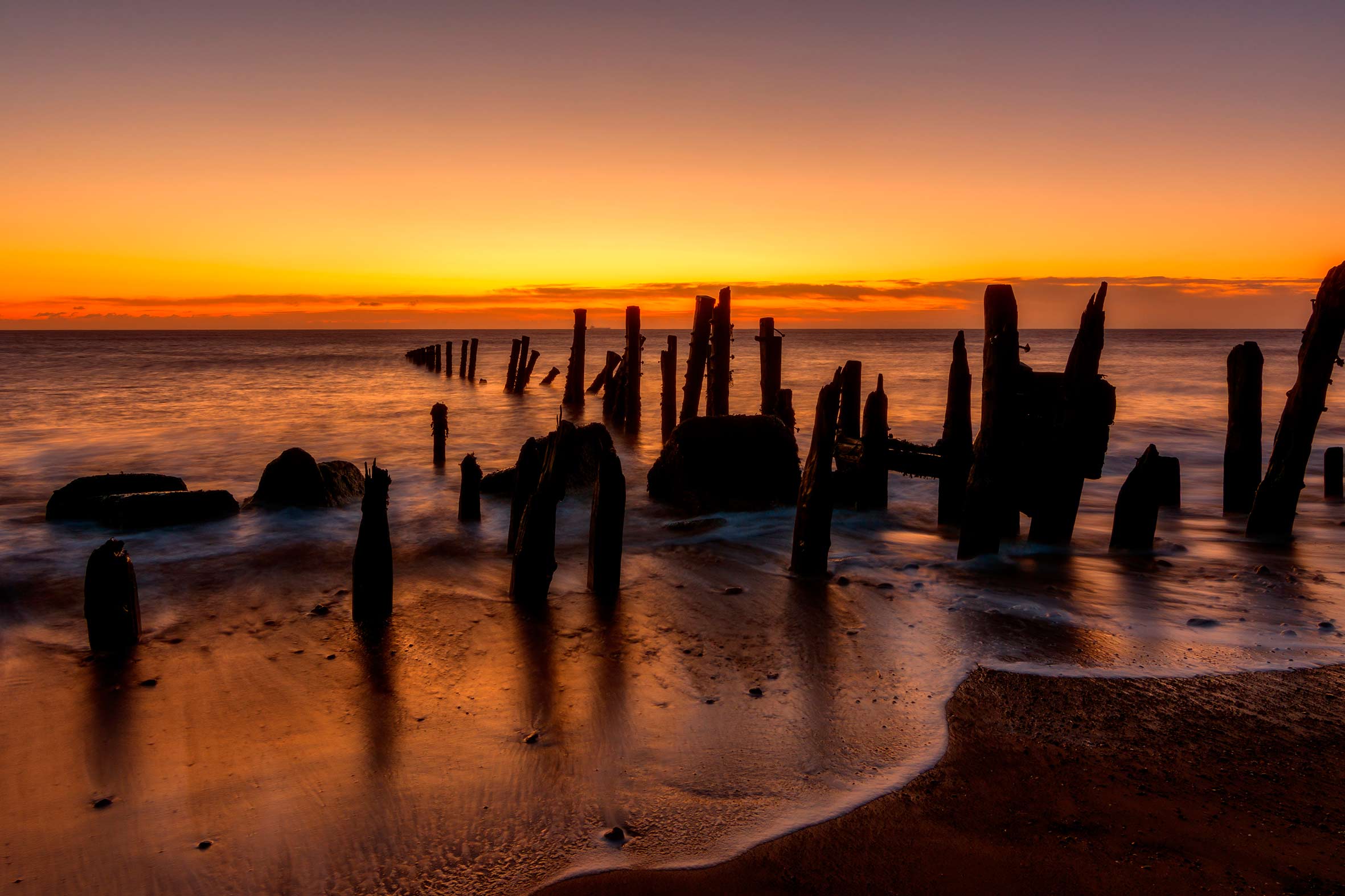 Por do sol na praia pintando