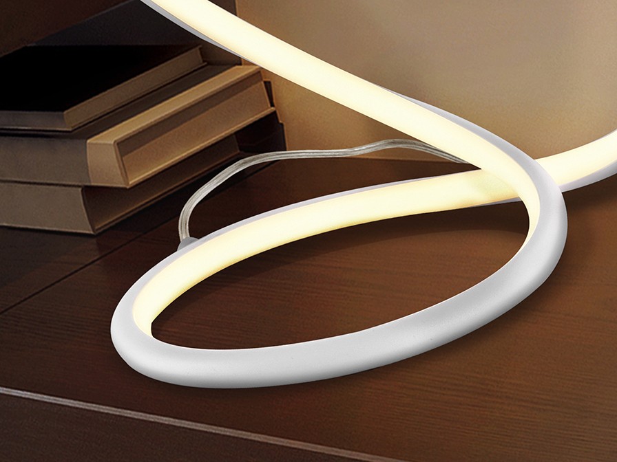 Ilumine seu espaço com o candeeiro de Mesa Infinito White. Esta peça moderna e elegante traz luz e sofisticação a qualquer ambiente.