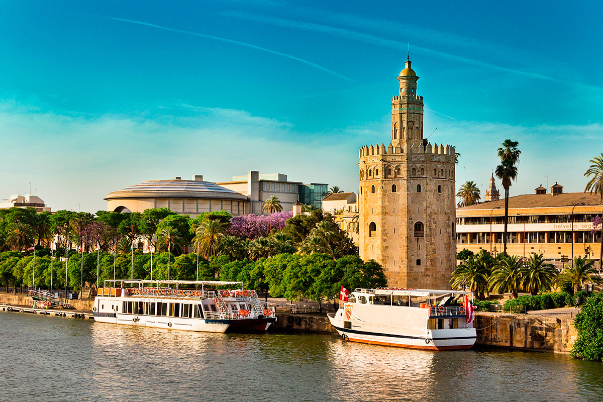 Rio Guadalquivir pintando Sevilha