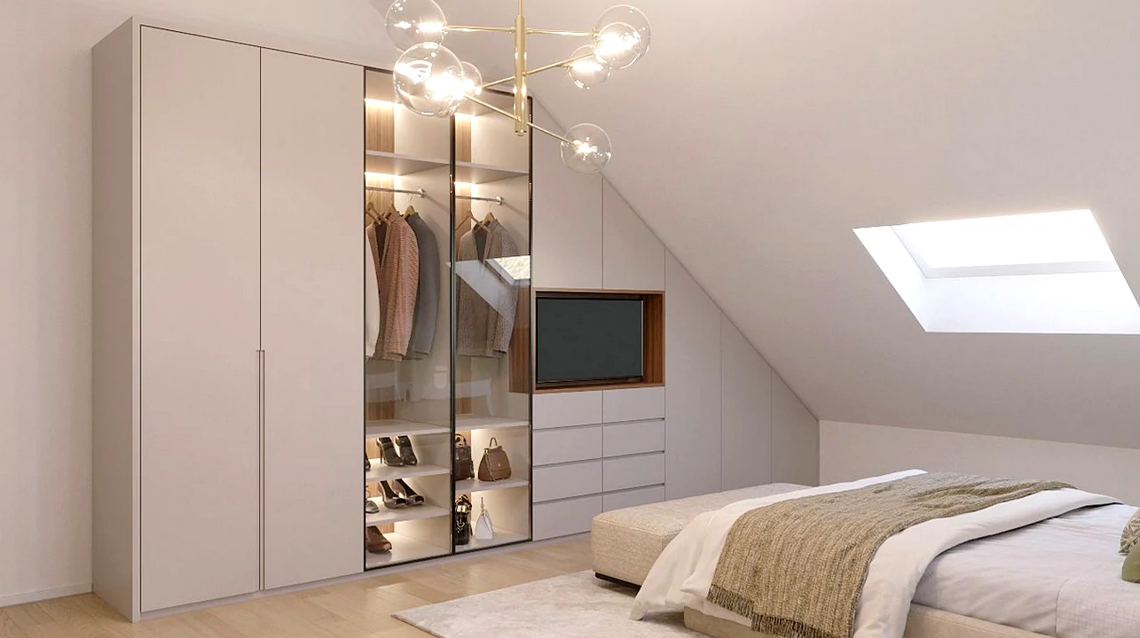 Roupeiro sob medida sobre teto inclinado, integrando-se perfeitamente à decoração do quarto