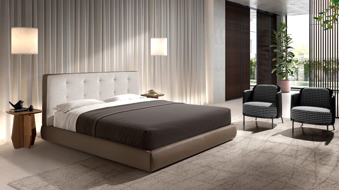 Cama estofada em tons suaves, tecido ou sintético, conforto e elegância no quarto.