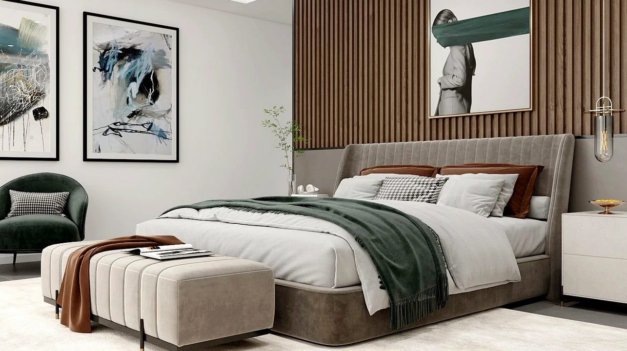 Cama estofada em tecido, peça central de um quarto acolhedor