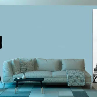 Sala com sofá claro, mesa baixa e quadro eiffel 2 com Torre Eiffel à direita