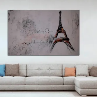 Quadro com desenho estilizado da Torre Eiffel em tela pendurada sobre sofá