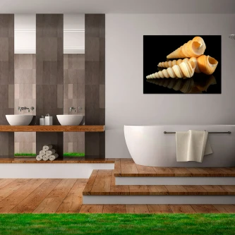 Quadro com três caracoletas amarelas sobre fundo negro