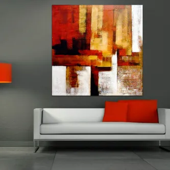Quadro Lumino abstrato em tons vermelhos, dourados e brancos sobre parede cinzenta