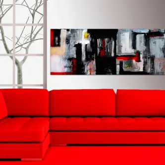 Quadro cor de Óleo abstrato em preto, branco e vermelho sobre parede acima de sofá vermelho