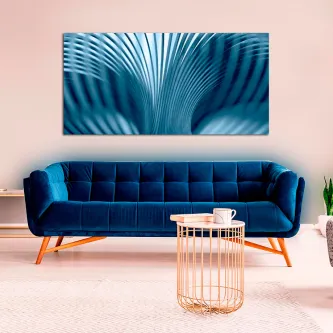 Quadro Furacão abstrato em padrões ondulados azuis acima de sofá azul