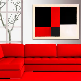 Quadro linhas retas com blocos geométricos vermelhos, pretos e brancos acima de sofá