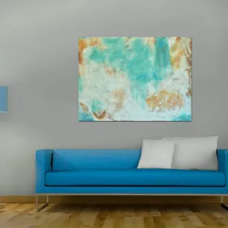 Quadro Bocado abstrato em turquesa e dourado sobre sofá azul