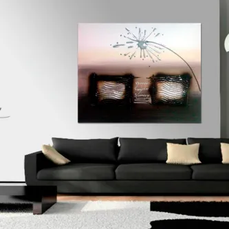 Quadro com flor luminosa em estilo dente-de-leão sobre sofá preto