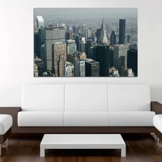 Quadro Met Life com foto da linha do horizonte de Nova Iorque sobre sofá branco