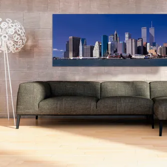 Quadro New York New York com panorama do skyline de Nova Iorque sobre sofá cinzento