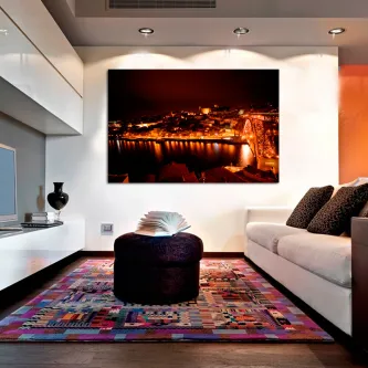 Quadro do Porto ao anoitecer com luzes refletidas no rio