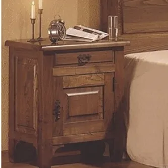 Mesa de cabeceira em madeira com gaveta, relógio, velas e livro ao lado da cama