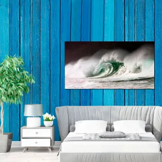 Quarto com quadro 'Super Onda' com onda gigante a romper no mar
