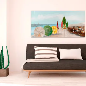 Quadro com sombrinhas coloridas à beira de um rio e cadeiras de praia