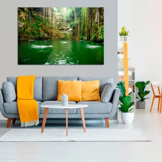 Quadro Caverna Encantada com lago verde dentro de caverna e vegetação pendente