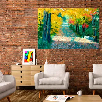Quadro de trilho arborizado com folhas amarelas iluminadas pela manhã