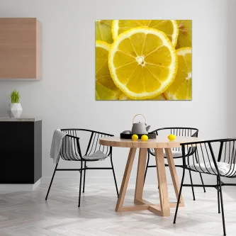 Quadro com rodelas de limão amarelas sobre fundo brilhante