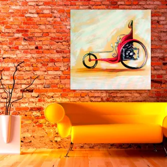 Quadro com pintura de veículo antigo vermelho sobre parede de tijolo junto a sofá amarelo