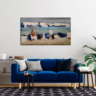 Pintura da costa azul pendurada sobre sofá azul em sala moderna