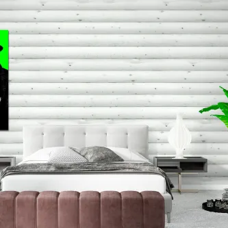 Quadro verde Bogart na parede de um quarto moderno com cama, mesa de cabeceira e planta