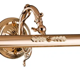 Aplique dourado estilo Picasso com ornamento em folha