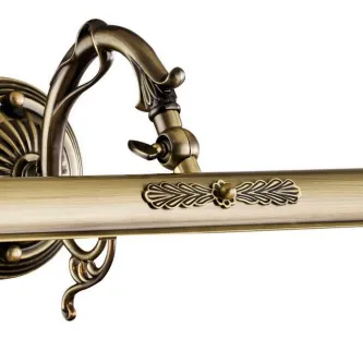 Aplique bronze ornamentado com braço curvo e detalhe floral