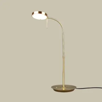 Candeeiro de secretária Monza em metal dourado com base circular e haste curva