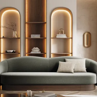 Sofá Flow curvo de três lugares em tecido cinzento com duas almofadas