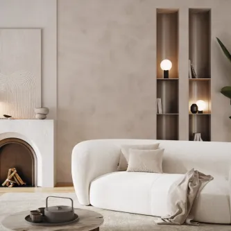 Sofá Moon branco de dois lugares numa sala minimalista com lareira e prateleiras