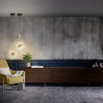 Candeeiro suspenso Essenza com dois globos de vidro dourado, luz quente, sobre móvel