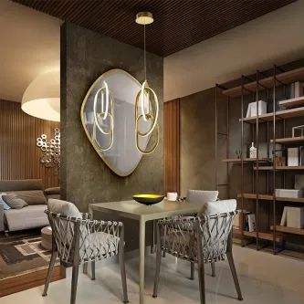 Candeeiro suspenso Nexo dourado com anéis iluminados sobre mesa de jantar moderna