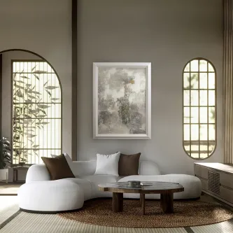 Pintura Matriz abstrata emoldurada sobre sofá curvo numa sala luminosa