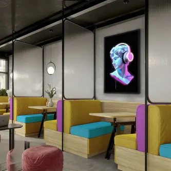 Quadro iluminado com busto colorido em neon numa parede de café