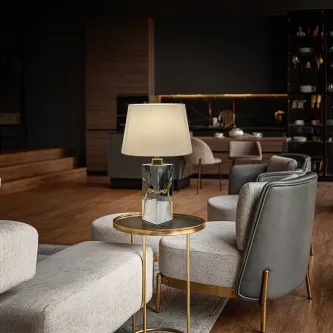 Candeeiro de mesa Ocean com base em mármore preto, detalhes dourados e abajur branco