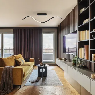 Candeeiro suspenso Boa preto ondulado sobre sala de estar moderna