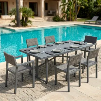 Mesa de jardim Cube cinzenta com tampo retangular e seis cadeiras junto à piscina