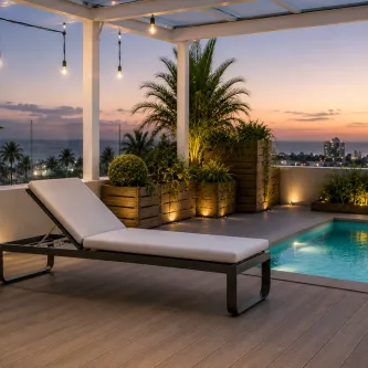 Espreguiçadeira Star branca junto à piscina num terraço ao pôr do sol