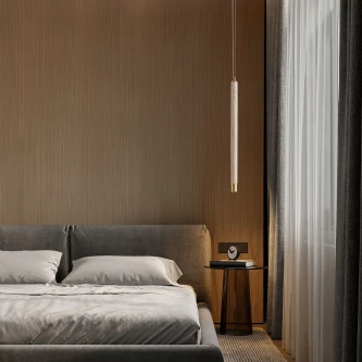 Candeeiro suspenso Muse pendente junto a cama num quarto minimalista