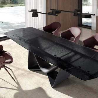 Mesa de jantar extensível Dilor preta com tampo texturizado e base escultórica
