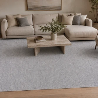 Tapete Ocean cinzento claro em sala com sofá e mesa de centro