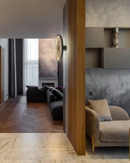 Aplique Stone D30 montado na parede de uma sala contemporânea