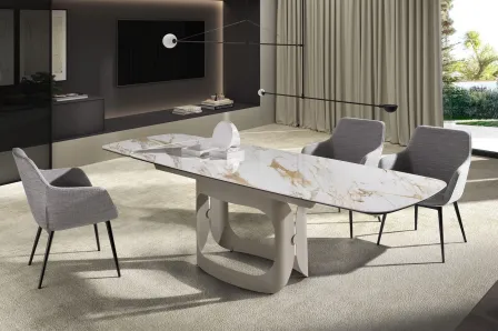 Mesa extensível Lunar pé aberto com tampo em mármore branco e base escultórica