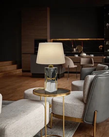 Candeeiro de mesa Ocean com base em mármore preto, detalhes dourados e abajur branco