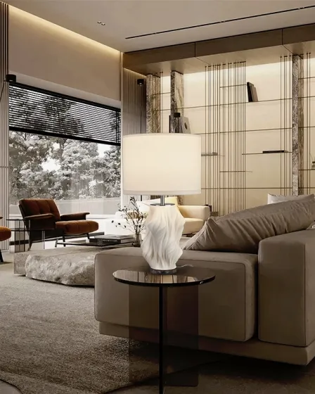 Candeeiro de mesa Kaos branco com base escultórica sobre mesa lateral junto a sofá