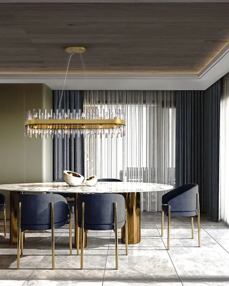 Candeeiro de teto Grace 28L dourado com cristais sobre mesa de jantar