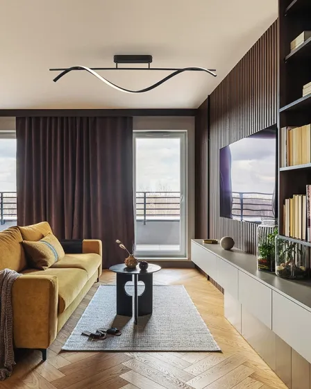 Candeeiro suspenso Boa preto ondulado sobre sala de estar moderna