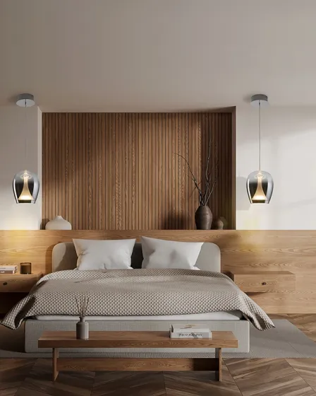 Candeeiro suspenso Suspiro D18 sobre mesinha de cabeceira em quarto moderno